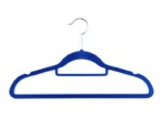 Suit hanger with tie bar and indent
