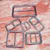 Covering Buckle - 116, 118, 412, 974